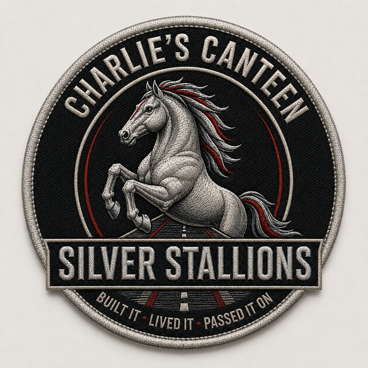 Charlie's Canteen Silver Stallions heritage patch with silver stallion and Built It, Lived It, Passed It On motto